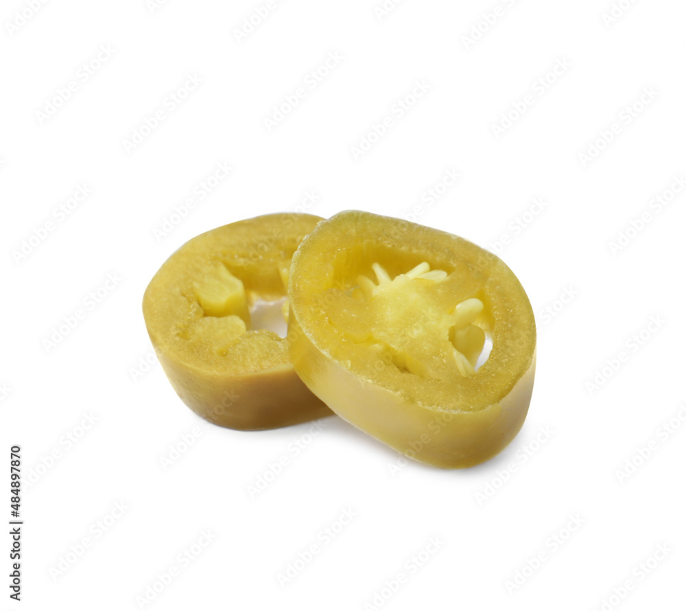 Slices of pickled green jalapeno on white background