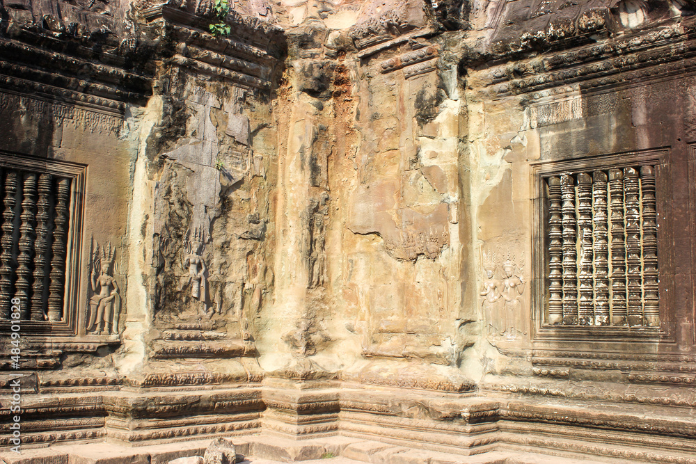Reliefs carved into the walls of the ruins of Angkor Wat. Reliefs carved into the walls of the ruins of Angkor Wat.