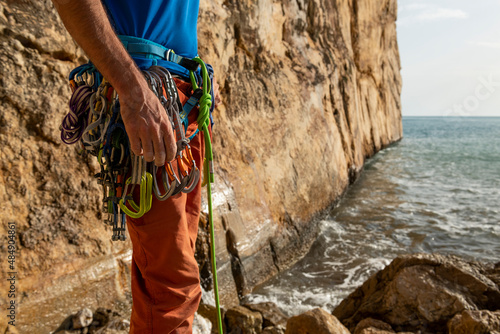 Getting ready to climb in Raco del Corv cove /  Luces Nocturnas route 6b photo