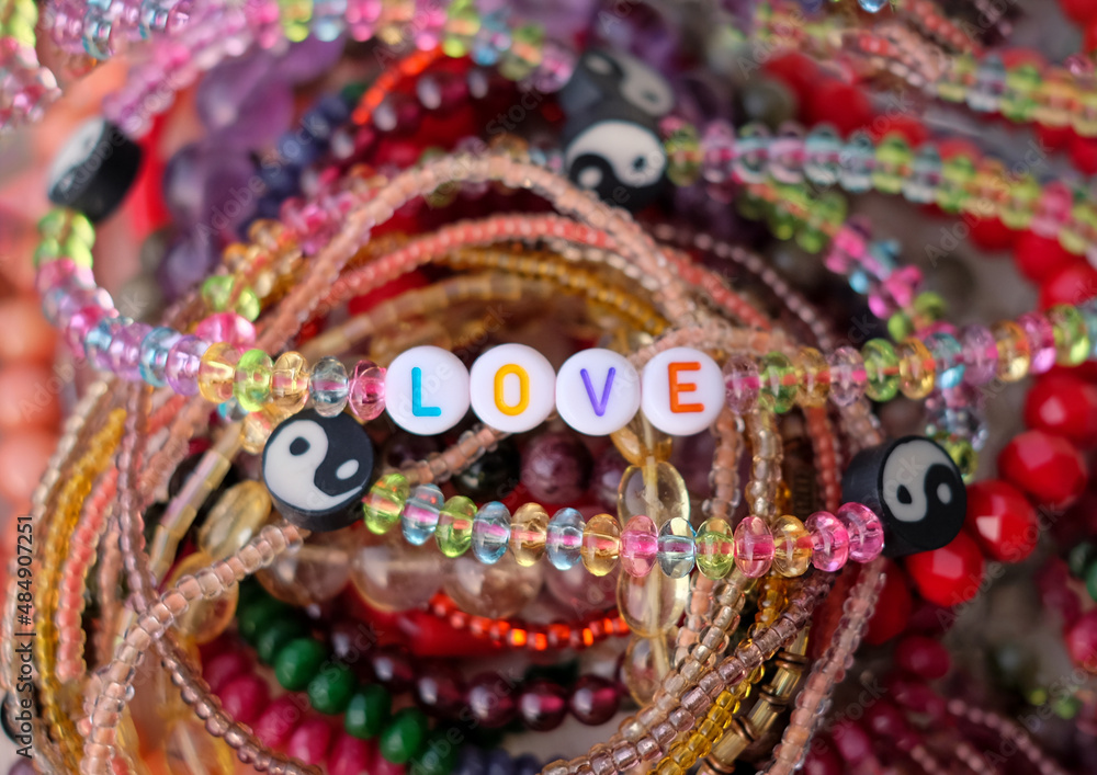 Love word beads close-up on accessories background