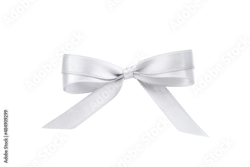 Beautiful silver ribbon tied in bow isolated on white, top view
