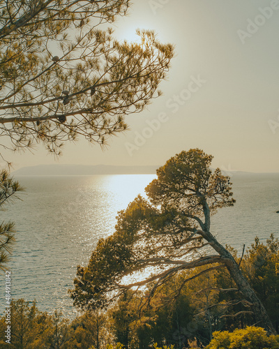 rocky beach in croatia makarskar, beatuful sun colors photo