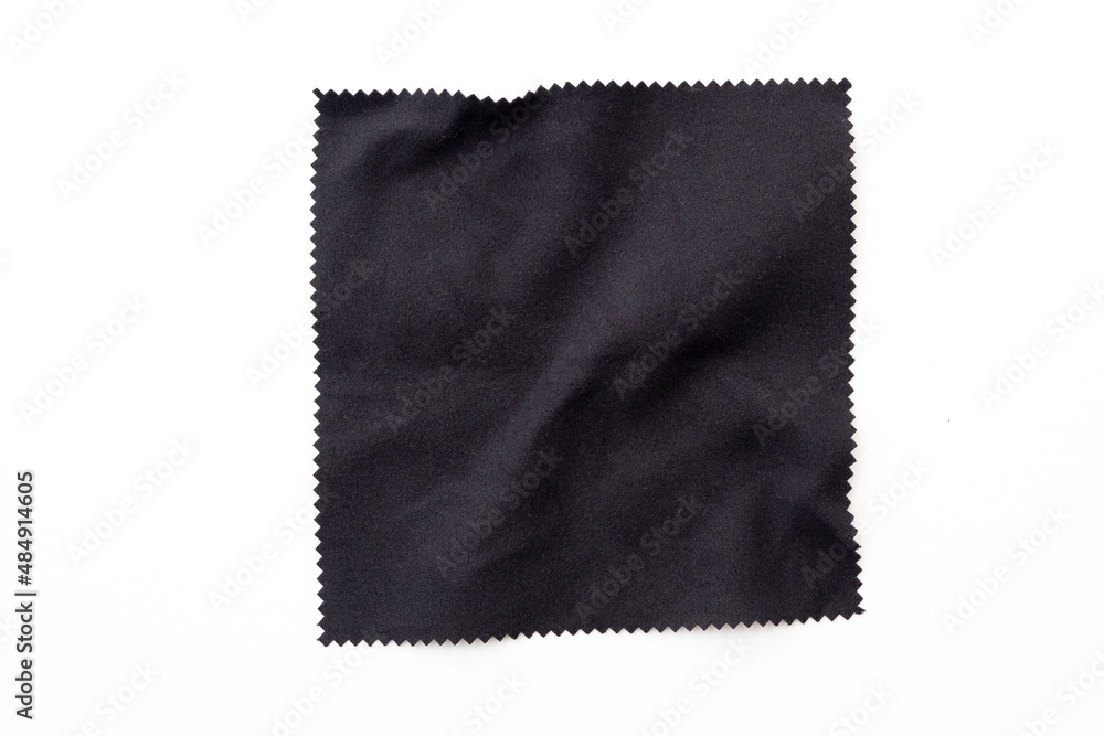 Black square piece of cloth, napkin isolated on white - obrazy, fototapety, plakaty 