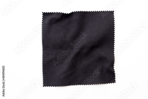 Black square piece of cloth, napkin isolated on white