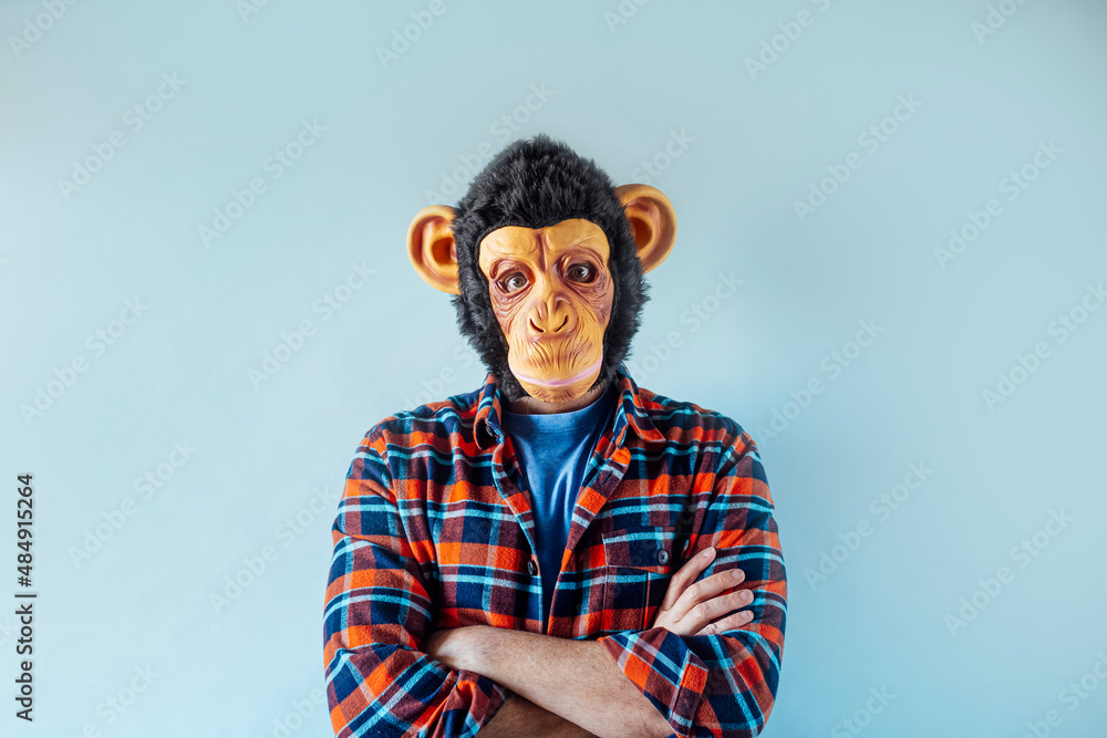 Man in monkey mask gesturing. Man in monkey mask gesturing.