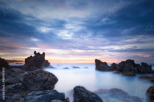 Beautiful sky and wave flow on the beach