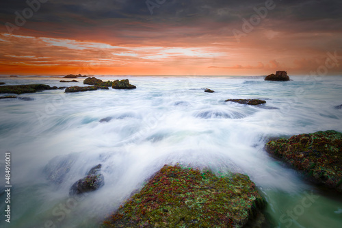 Beautiful sky and wave flow on the beach