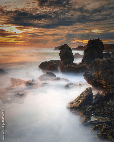 Beautiful sky and wave flow on the beach