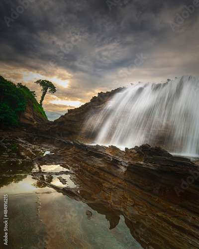 Beautiful sky and wave flow on the beach
