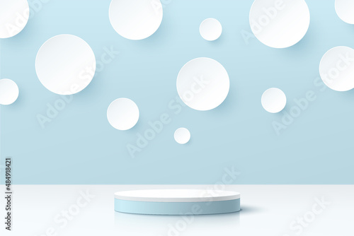 Abstract 3D room and realistic blue cylinder pedestal podium with white circles or polka dot scene. Minimal scene for product display presentation. Vector geometric platform design. Stage for showcase © Riseness