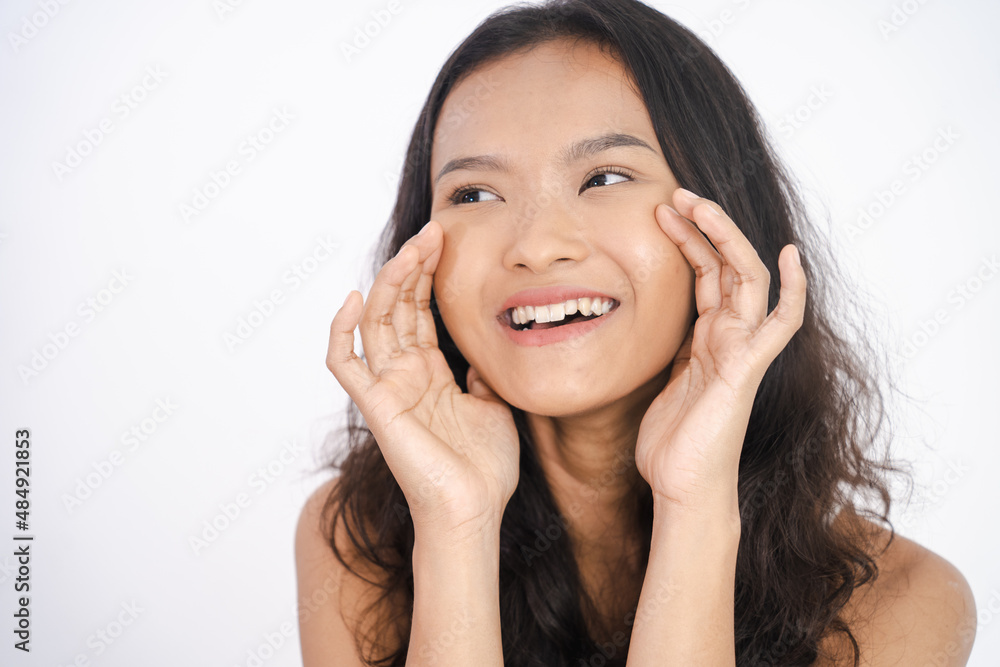 asian woman with clean fresh skin on white background asian woman with clean fresh skin on white background