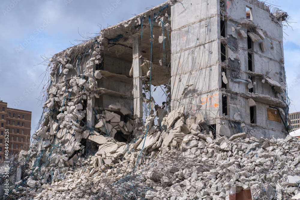 Remains and Rubble Pile of Collapsed Building During Final Stages of Demolition Remains and Rubble Pile of Collapsed Building During Final Stages of Demolition