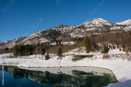 The snowy mid-December landscape at Lake Barcis in Pordenone province, Friuli-Venezia Giulia, north east Italy 