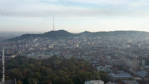 Aerial roofs and streets Old City Lviv, Ukraine. Panorama of the ancient town. Central part of old european city Lviv in morning time.