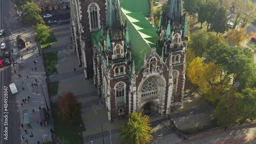 Aerial view of historical Church of Saints Olga and Elizabeth old gothic temple in town Lviv, Ukraine. Flying by drone over dome. 4k footage of landmarks, architecture of european Lviv city