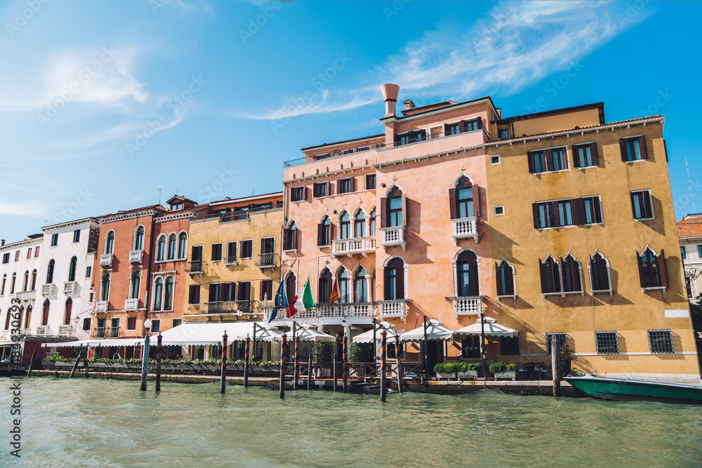 Scenic view on ancient architecture buildings in most romantic city of world - Venezia, getaway travel time for feeling freedom and happiness in Italy - sightseeing around historic center