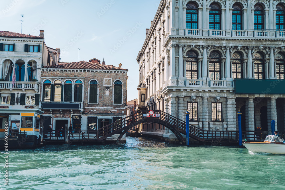 Concept of touristic journey trip for visiting romantic Italian city - Venezia during summertime for travelling around Europe, landscape view of beautiful historic buildings located at Grand Canal