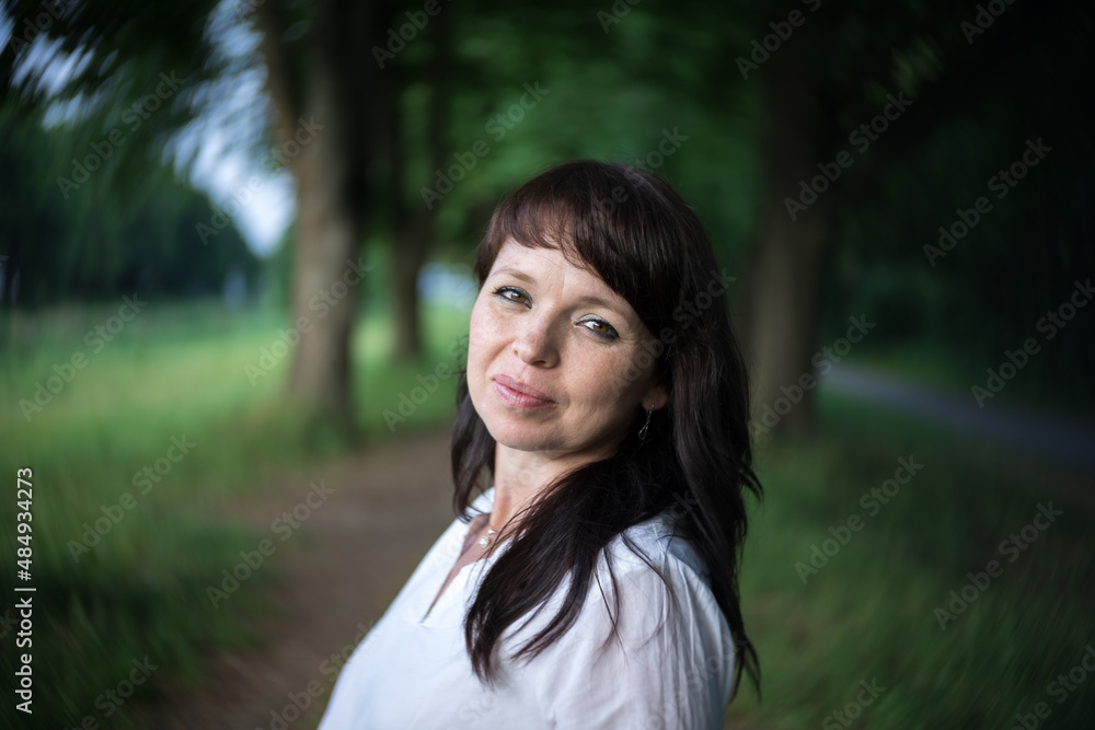 Portrait of a woman on the background of nature. Portrait of a woman on the background of nature.