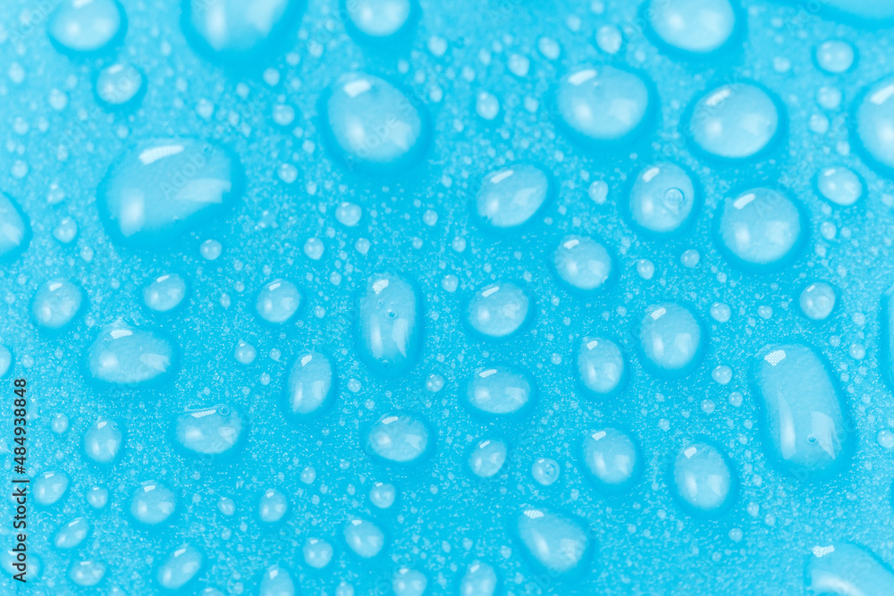 Water drops bubble texture, abstract blue background, close-up, macro. Selective focus