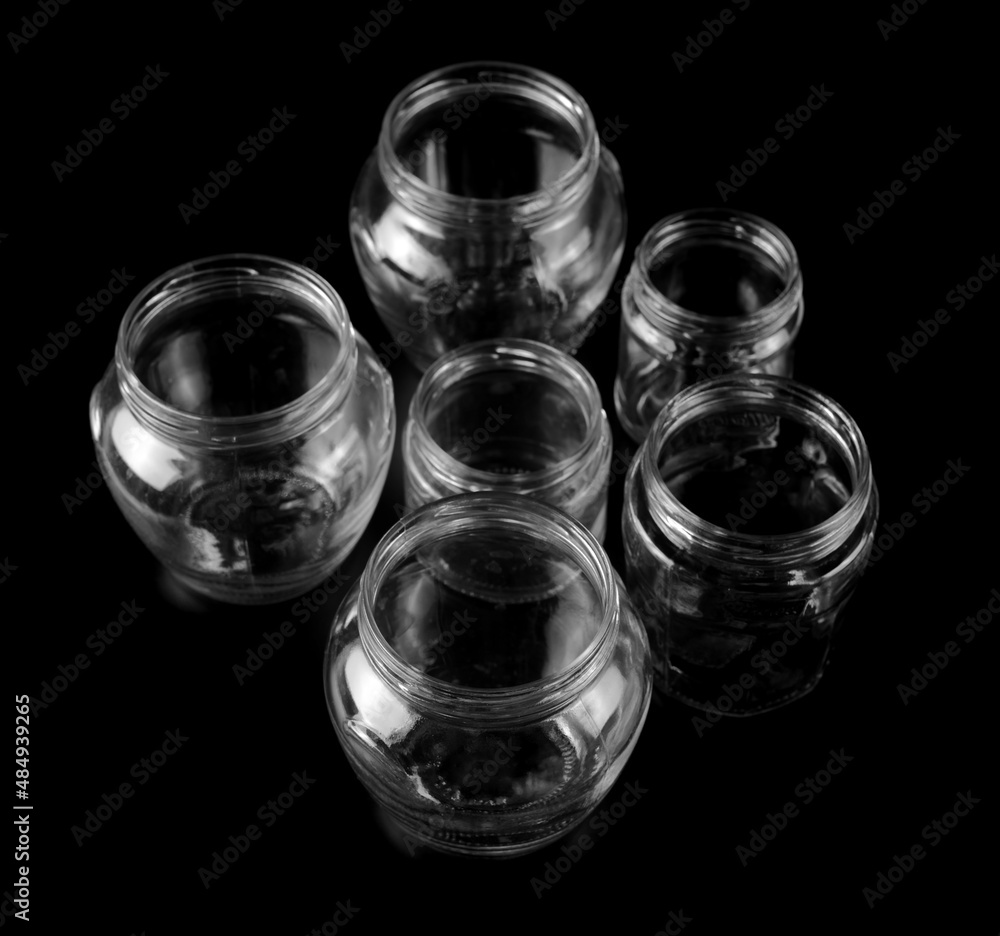 Empty glass jar isolated on black Empty glass jar isolated on black