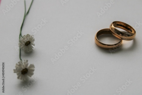 wedding rings and a bouquet