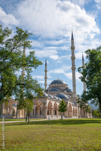 View of the Tashu-Hajji Mosque from the park on a September day. Chechen Republic, Gudermes, Russia photo