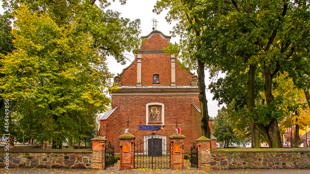 Built in the years 1477-1507 in the Gothic and Neo-Baroque styles, the historic Catholic Church of Our Lady of the Rosary with a belfry in the city of Drobin in Mazovia, Poland. Built in the years 1477-1507 in the Gothic and Neo-Baroque styles, the historic Catholic Church of Our Lady of the Rosary with a belfry in the city of Drobin in Mazovia, Poland.