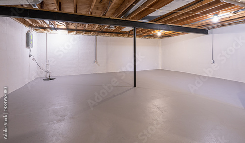 basement floor has been sealed and repairs are complement photo