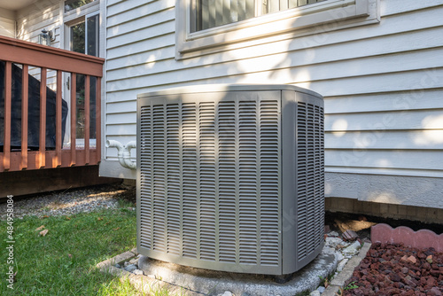 residential air conditioner has new condenser installed photo