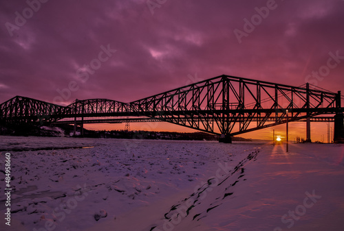 Quebec bridge at sun set in winter time