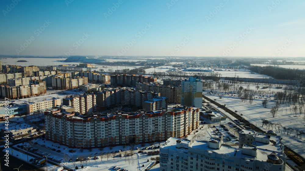 Fototapeta premium City block. Modern multi-storey buildings. Winter cityscape. Aerial photography.