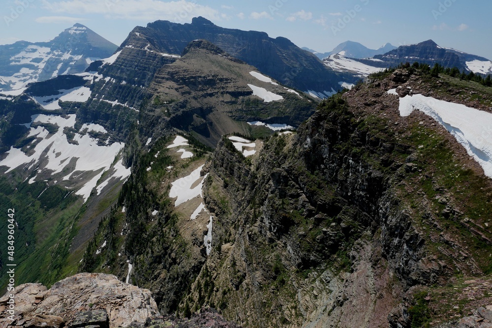 Glacier National Park in the background at the summit of Forum Peak on the continental divide
