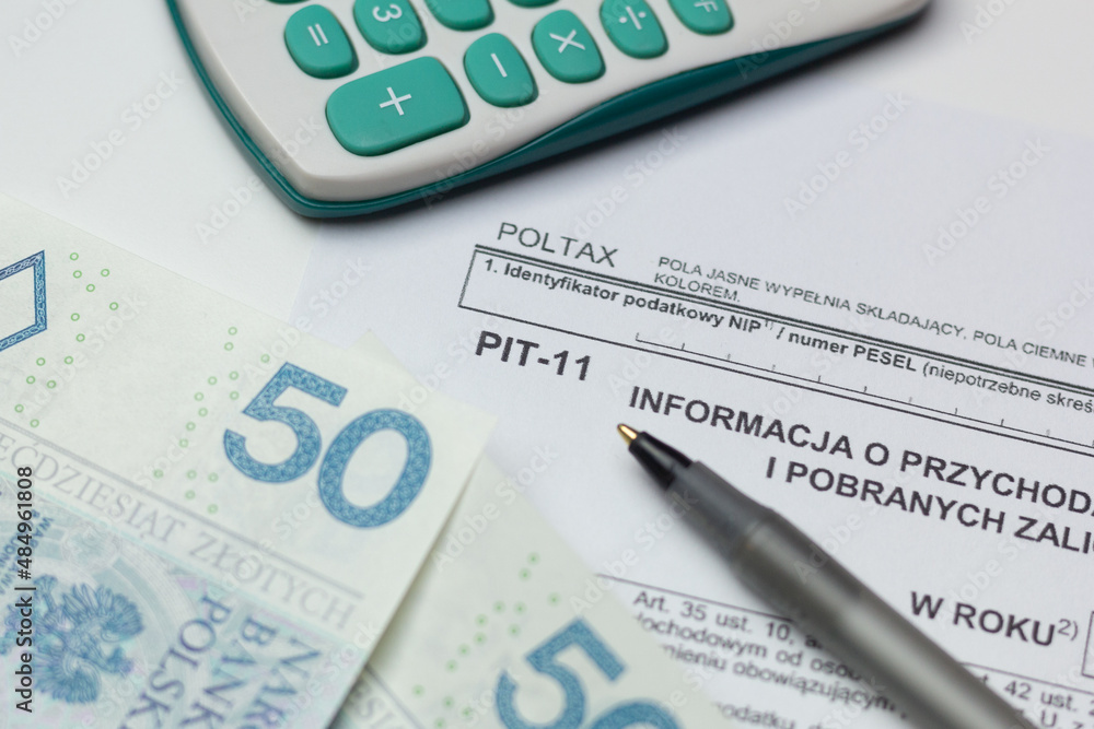 Closeup of PIT-11 tax form – information on income and income tax withholdings.
Closeup of PIT-11 tax form – information on income and income tax withholdings.