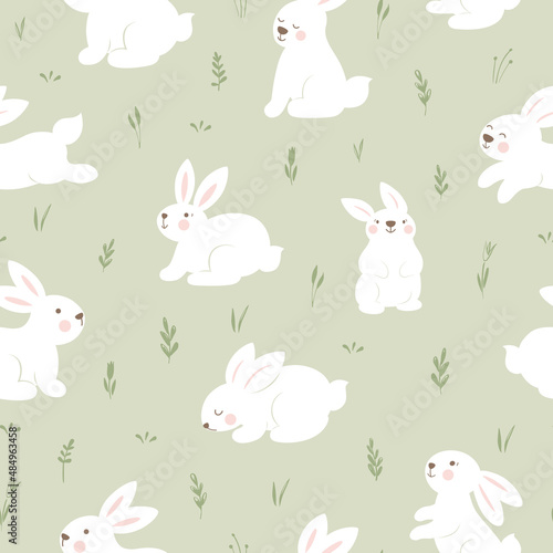 Seamless pattern with bunnies and plants on green background. Easter vector print.