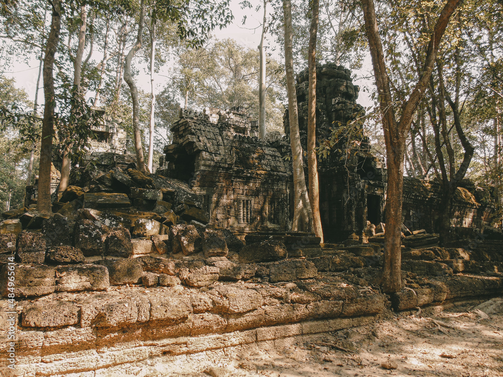 Ruins of an ancient stone temple lost in the Cambodian jungle - Ta Nei of Angkor temples