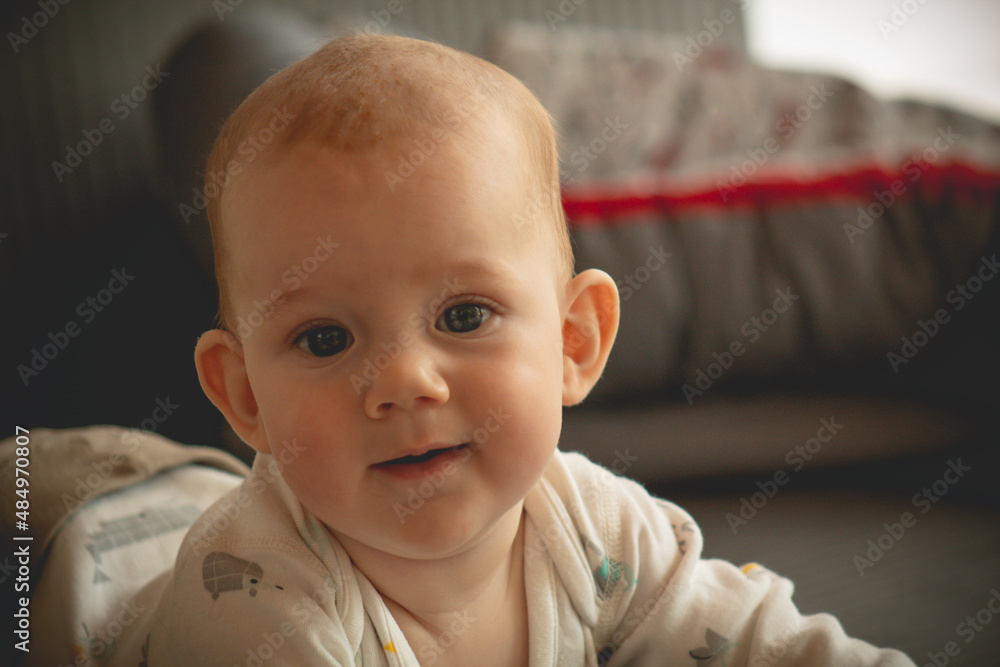 Surprised cute baby and looking at the viewer Surprised cute baby and looking at the viewer