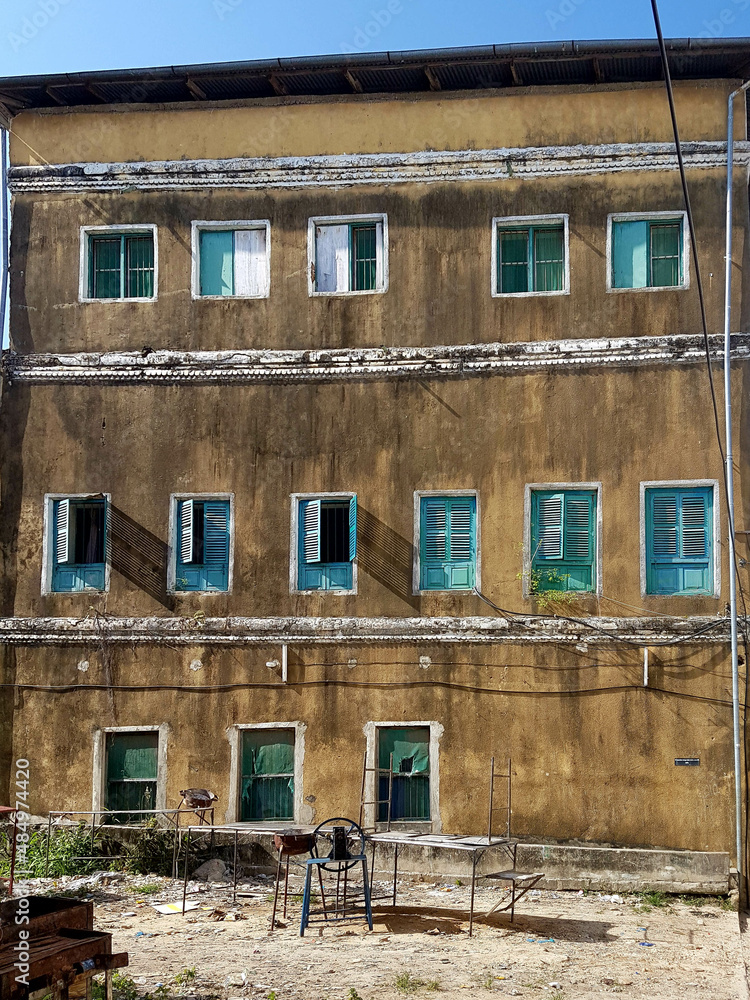 Stone Town Zanzibar Tanzania Africa old interesting building a on summer day with no people with vintage cozy windows