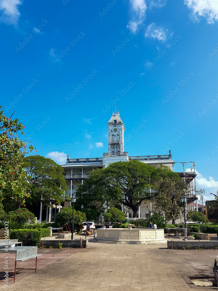 Stone Town Zanzibar Tanzania Africa streets with interesting buildings architecture on summer day with trees 