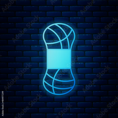 Wallpaper Mural Glowing neon Yarn icon isolated on brick wall background. Label for hand made, knitting or tailor shop. Vector Torontodigital.ca