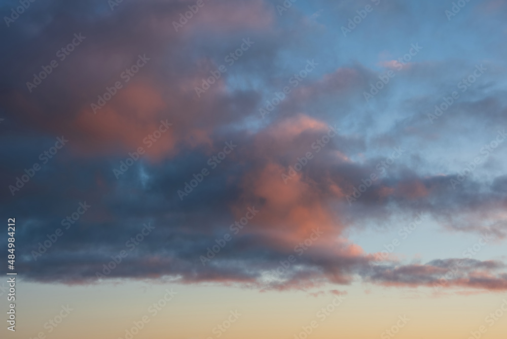 Beautiful multi colored sunset landscape image with vibrant tones for use as background or in composite images