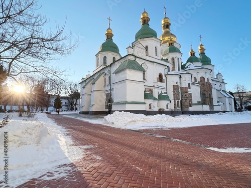 St. Sophia Cathedral in Kyiv, Ukraine, architectural monument of Kyivan Rus. It was built in 11th century. Majestic view of ancient church in white snow at winter season. photo