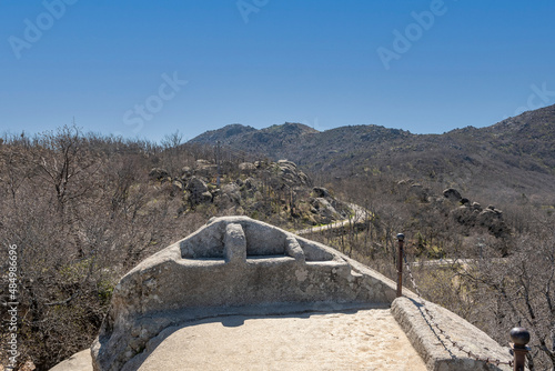 Chair of Felipe II, a set of stepped platforms and other elements carved on a granite scree at the foot of Las Machotas, in the municipality of San Lorenzo de El Escorial (Madrid, Spain) photo