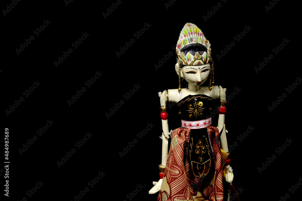Close-up view of Wayang Golek or traditional Sundanese puppet arts made from wood from West Java, Indonesia. Close-up view of Wayang Golek or traditional Sundanese puppet arts made from wood from West Java, Indonesia.