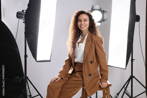 Beautiful African American model posing in studio. Professional photo session