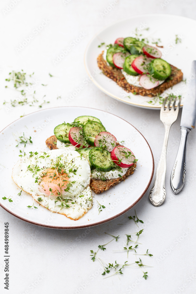 Keto Toasts with cucumber, egg, mozzarella and microgreens. Keto Toasts with cucumber, egg, mozzarella and microgreens.