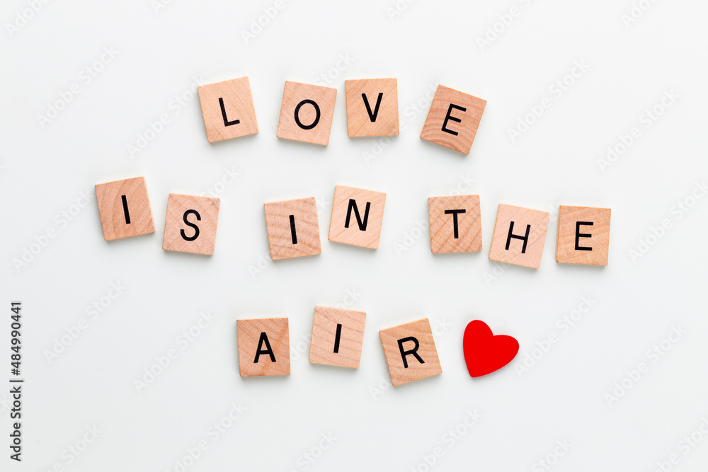 Wooden blocks in a pastel board with the text end heart. Wooden blocks in a pastel board with the text end heart.
