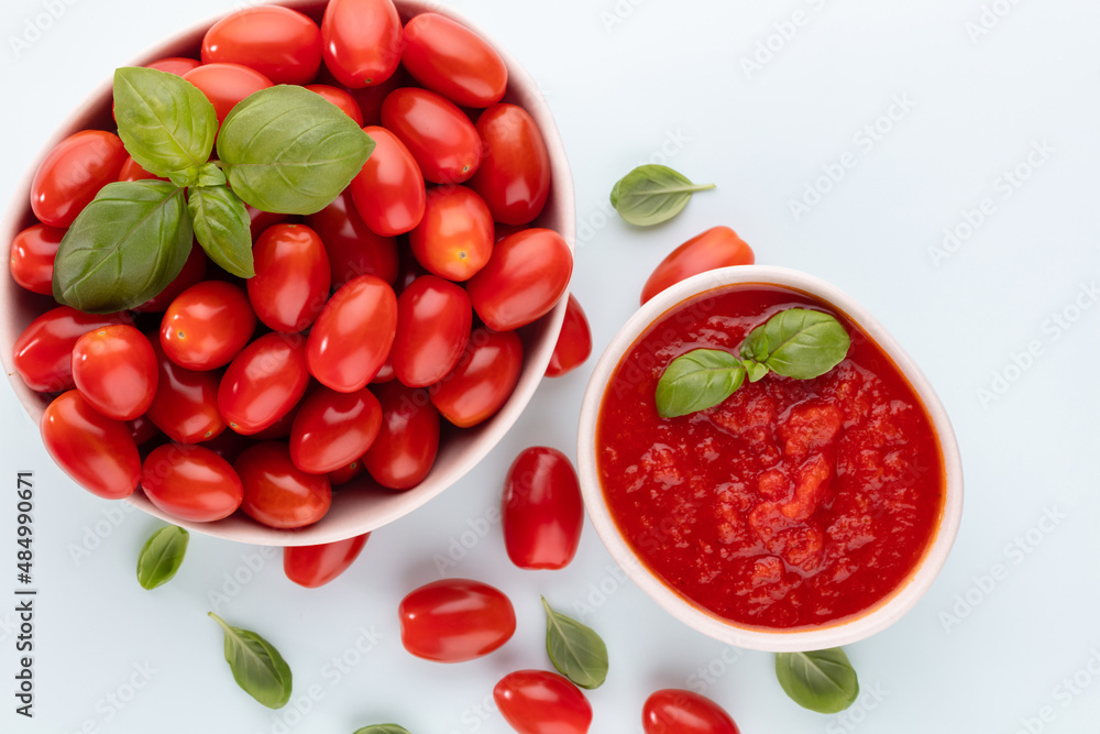 Fresh tomatoes in bowl on pastel table. Fresh tomatoes in bowl on pastel table.