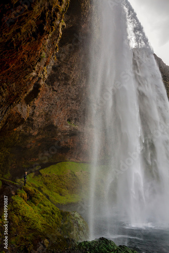 Under the waterfall