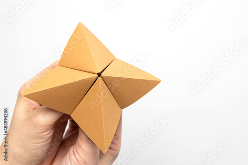 Paper fortune teller isolated on white background