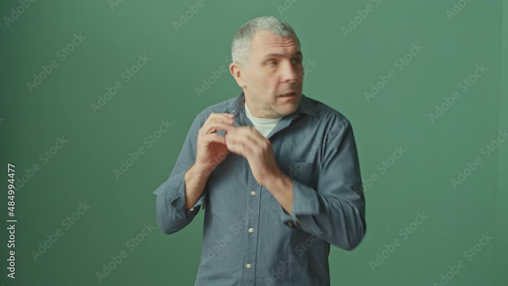 A Worried Man Looking Anxiously Around, Afraid of the Government Spying on Him. Paranoia, Mental Disorder, Fear. Conspiracy Theory and People Control Concept. Mental Health. A Worried Man Looking Anxiously Around, Afraid of the Government Spying on Him. Paranoia, Mental Disorder, Fear. Conspiracy Theory and People Control Concept. Mental Health.